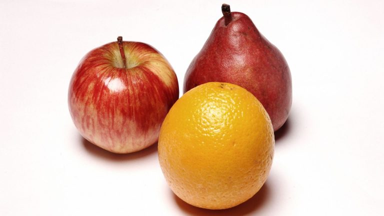 Apple, pear, and orange side by side representing differences between AuDHD, ADHD, and Autism.